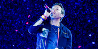 Image: Chris Martin of Coldplay performs on a stop of the band's Music of the Spheres world tour