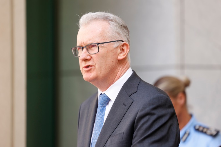 Minister for Home Affairs Tony Burke speaks to the media at Parliament House on Dec. 19, 2025, in Canberra, Australia.