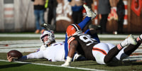 Dec 21, 2025; Cleveland, Ohio, USA;  Buffalo Bills quarterback Josh Allen (17) is sacked by Cleveland Browns defensive tackle Mason Graham (94) and defensive end Myles Garrett (95) during the first half at Huntington Bank Field. Both Cleveland players were credited with a half of sack on the play. Mandatory Credit: Ken Blaze-Imagn Images